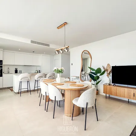 Higueronrentals Sunny Sea View Retreat