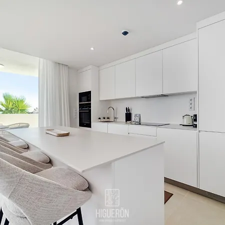 Higueronrentals Sunny Sea View Retreat